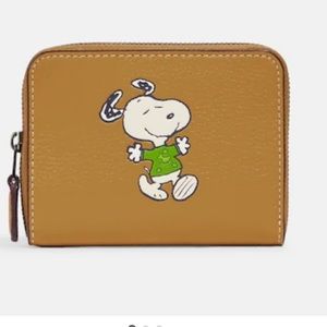 NWT Coach X Peanuts Small Zip Around
Wallet With Snoopy Walk Motif